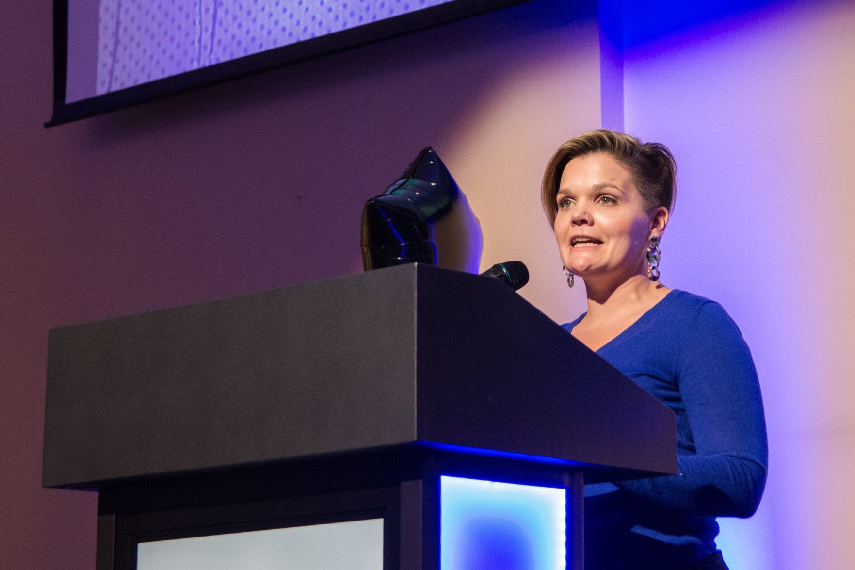 Katie Heiden-Rootes, recipient of the ARCHway Health Award, speaks at the event